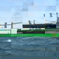 Autonomous discharging crane